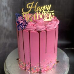 Pink Themed Tall Birthday Cake